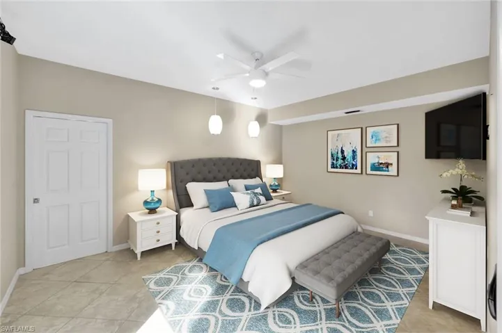 virtually staged Bedroom featuring ceiling fan and light tile patterned floors
