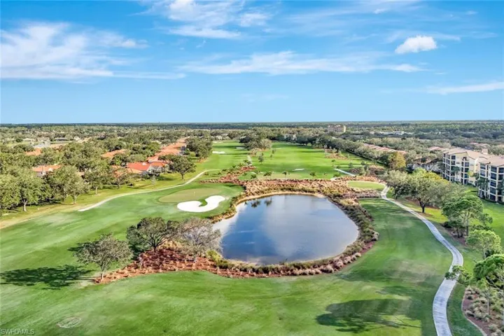 Bird's eye view of a nearby body of water and a local golf course