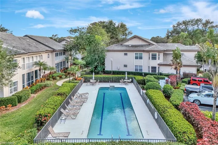Community pool featuring a patio area