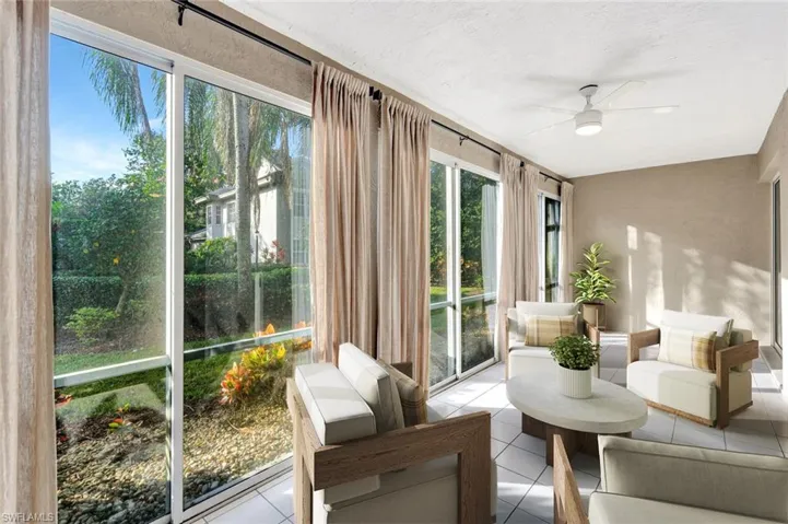 virtually staged Sunroom featuring tile patterned flooring
