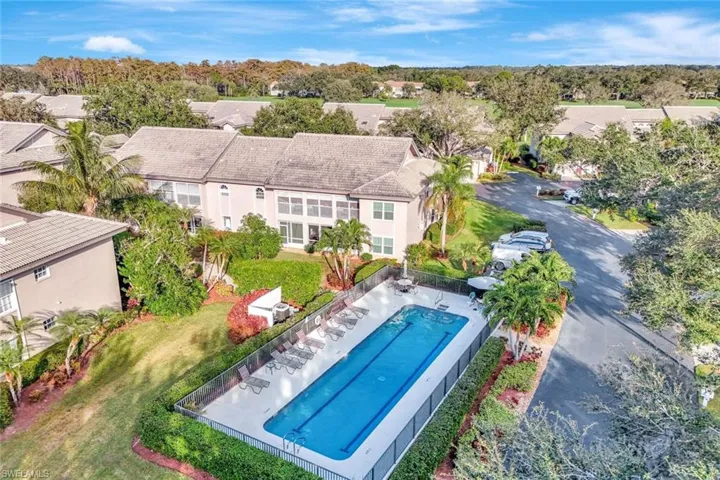 Aerial view of residential area with a pool