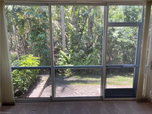 Lanaiis part of living space with glass sliders