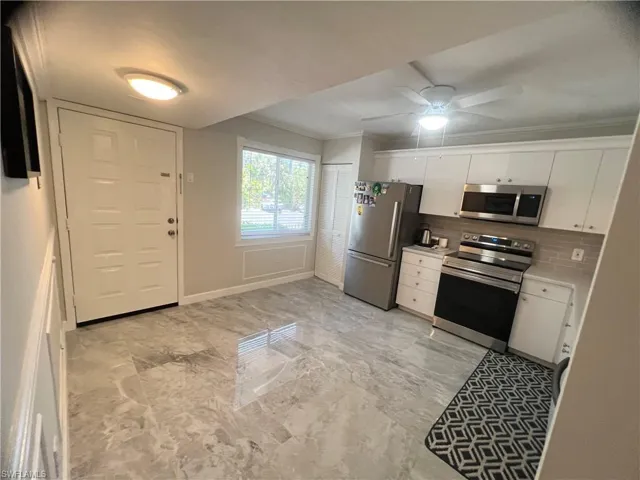 Kitchen with stainless steel appliances
