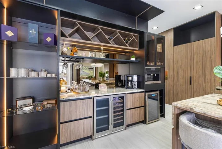 Wait.... This BAR! a Wine and Beer Fridge? A Beverage Fridge for my coffee items? A built in Espresso maker? A coffee maker? Custom Wine bottle rack? What is this my own restaurant styled Bar? Why, YES IT IS!
