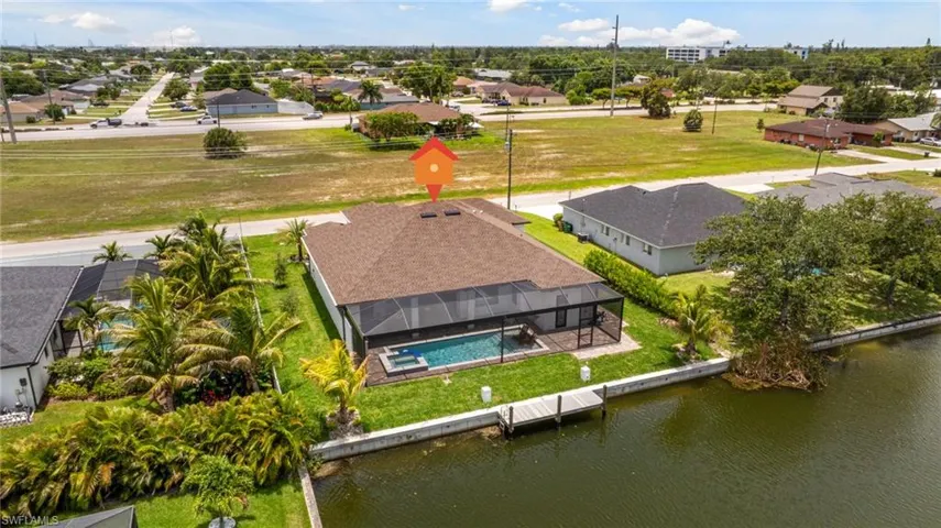 Private Composite Dock with Water and Electric. You can always add a lift! Custom Landscaping surrounds Your New Home! NO FLOOD ZONE!