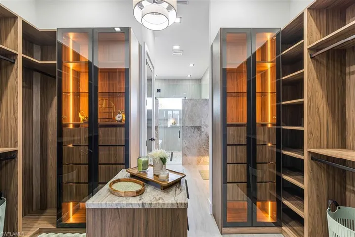 Are we in a high end luxury Department store to display my beautiful Shoes, Bags, Hats...... This Closet is CUSTOM and it is AMAZING!!!!!!
