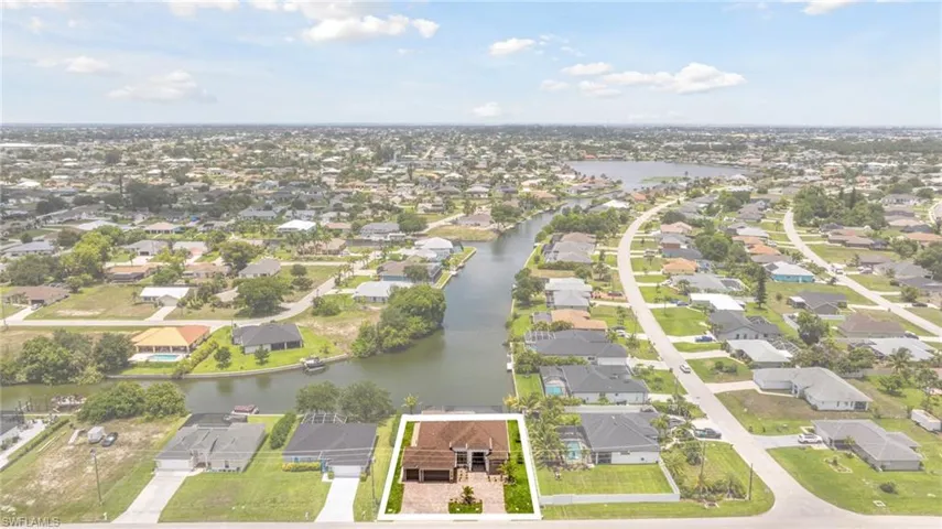 Beautiful 2026 CUSTOM New Construction Fresh Waterfront Home! Circular Driveway with 3 car garage.