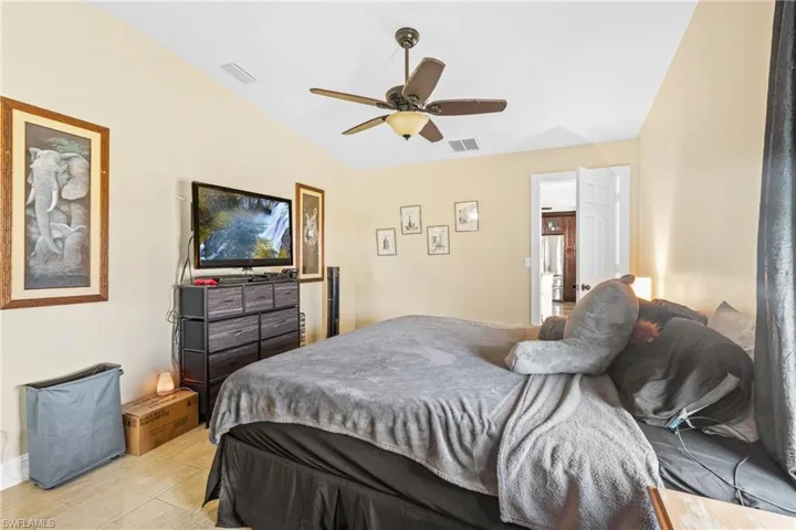 Bedroom featuring visible vents and a ceiling fan