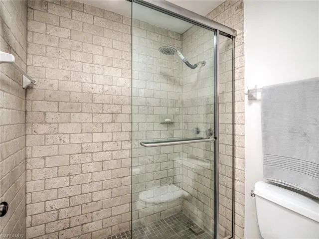 Separate shower with new glass doors