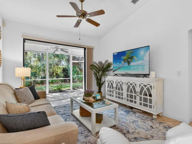 Natural sunlight surrounds you in the living room