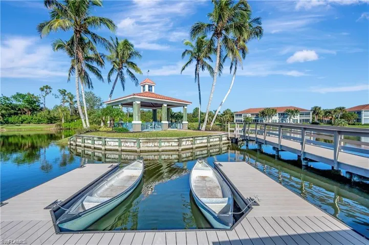 Dock area with a water view and a gazebo