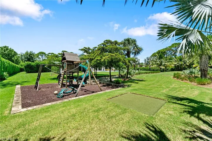 View of playground with a yard