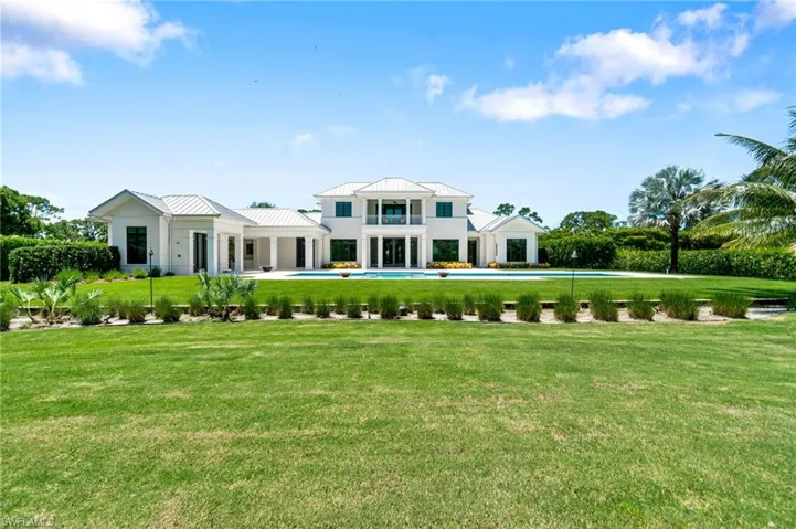 View of front of property with a front yard