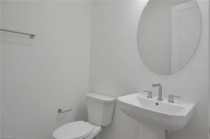 Bathroom with toilet and a sink