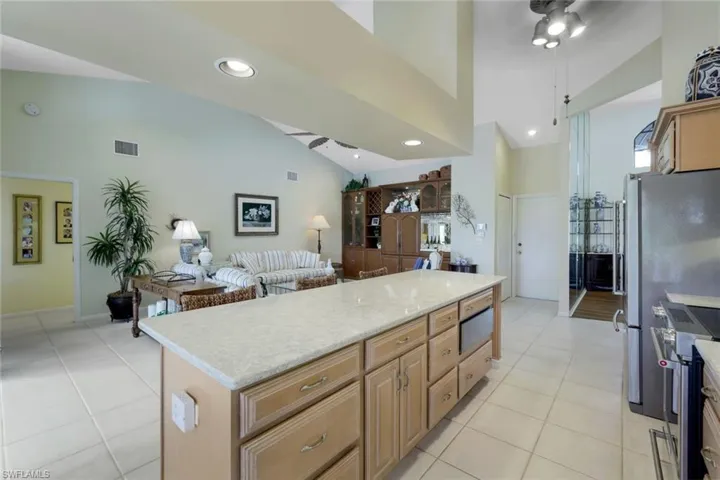 Center Island has Coastal Sea Quartz Counter- Electric and Warming Drawer