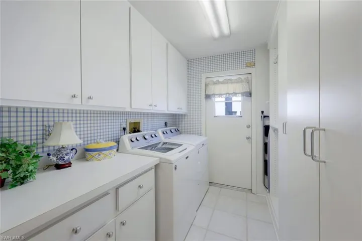 Large Laundry Room with Door to Outside- Custom Build Ins for Extra Storage or Seasonal Items