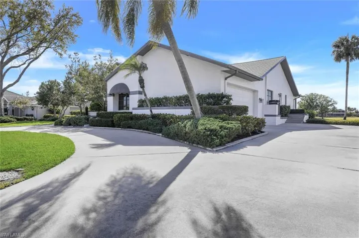 Corner View of 2 Concrete Driveways- Side Entry of Oversized Garage
