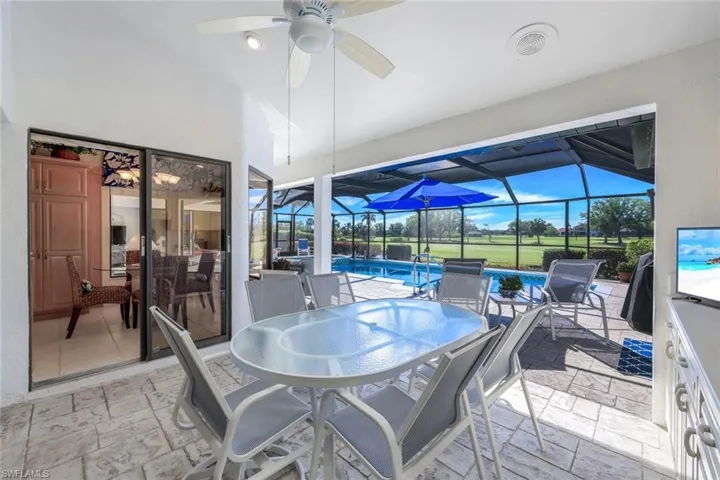 One of 3 Adjoining Screened Lanais- Outdoor Kitchen Area- Stamp Concrete Tile