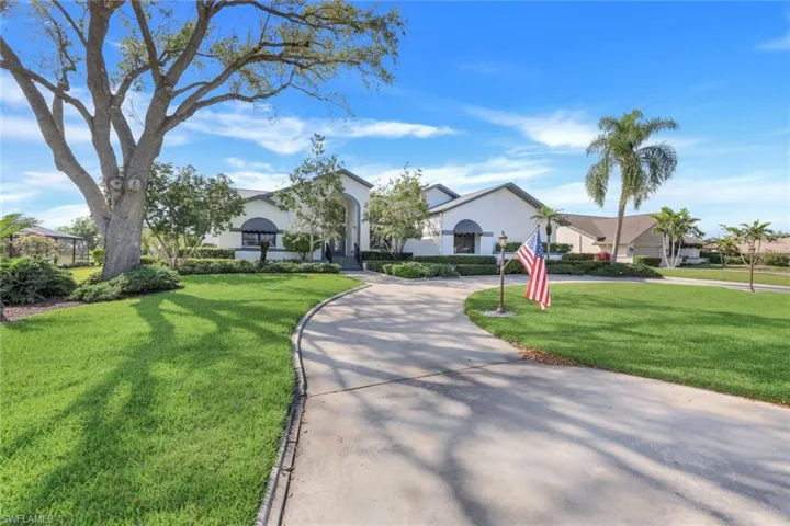 One of 2 Concrete and Curbed Driveways