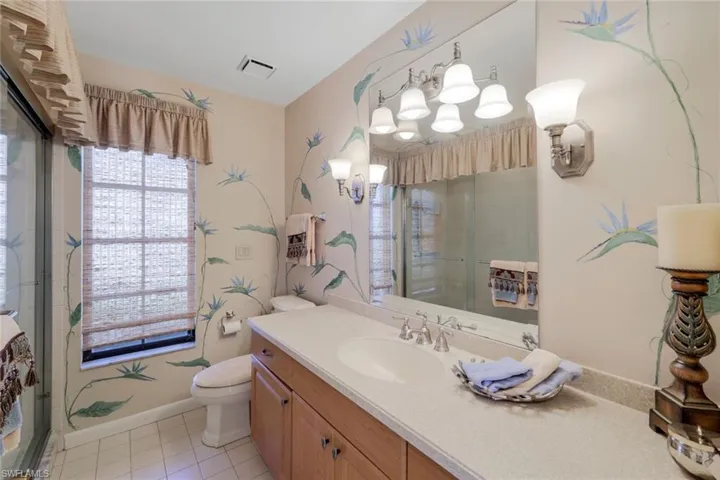 Full Guest Bath with Large Step In Shower, Custom Painted Bird of Paradise Flower Mural