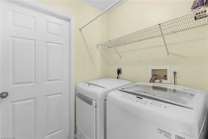 Laundry area featuring washing machine and dryer
