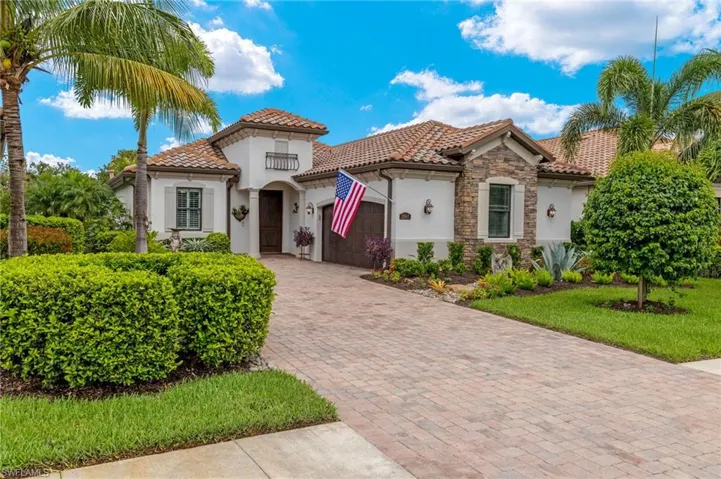 Mediterranean / spanish house with a garage