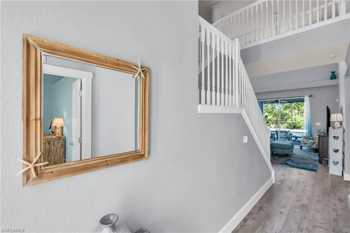 Staircase with wood-type flooring