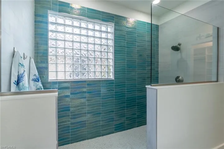 Bathroom with tiled shower