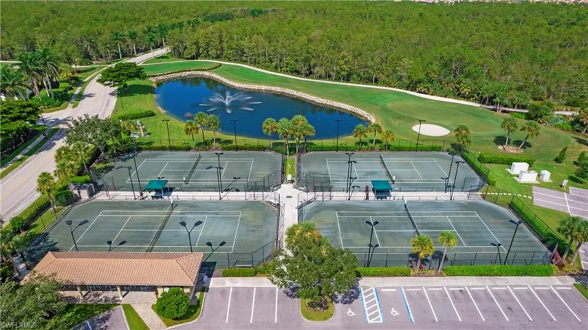 Bird's eye view of a nearby body of water and a golf course