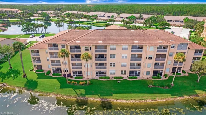 Aerial view of a nearby body of water and apartment complex