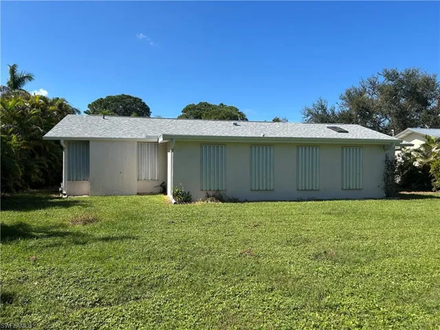 Rear view of house with storm shutters ON.
