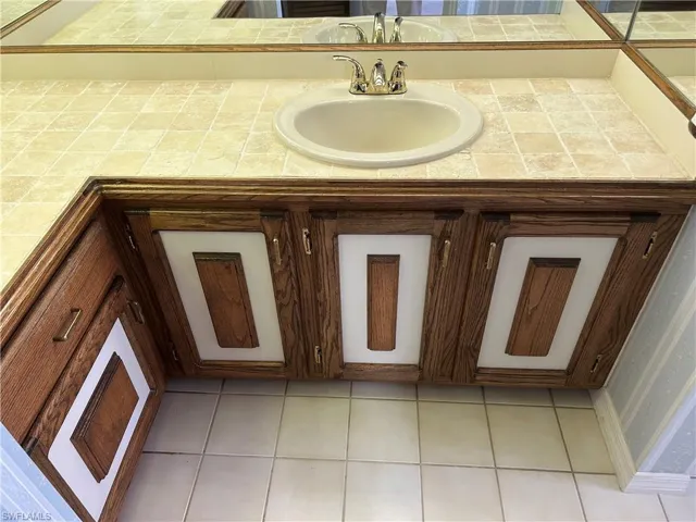 Custom wooden cabinets in Primary bathroom