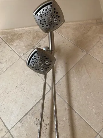 Lower level has double shower heads.