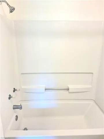 Bathroom with bathtub / shower combination