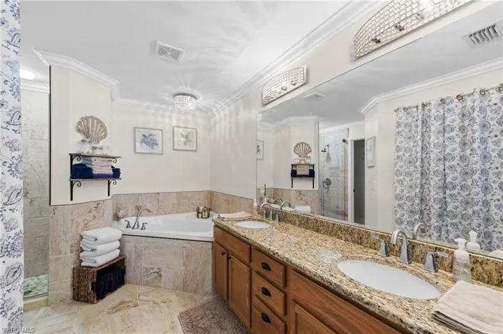Primary Bathroom with Granite and Dual Sinks