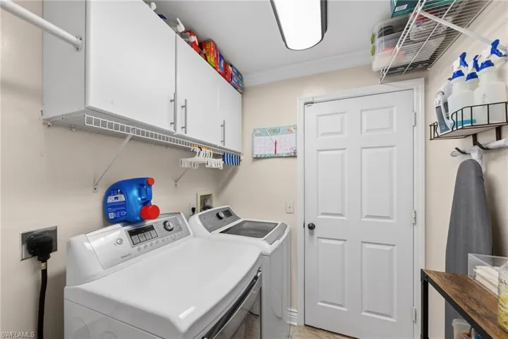 Laundry and Door to Two-Car Garage