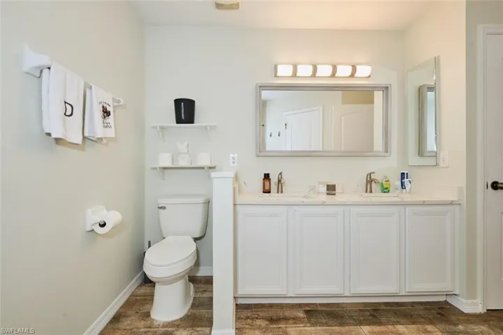 Bathroom featuring dual vanity