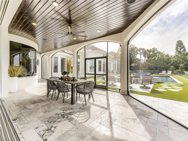 Sunroom featuring plenty of natural light
