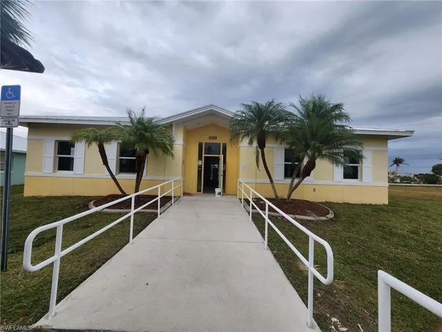 View of front of property with a front lawn