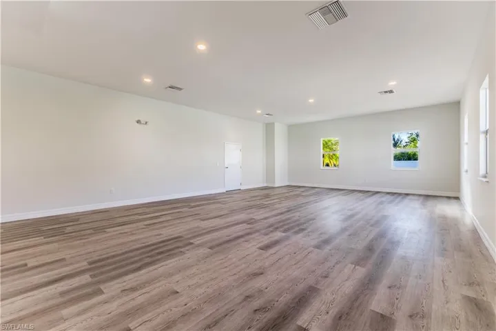 Unfurnished room featuring recessed lighting and light wood finished floors