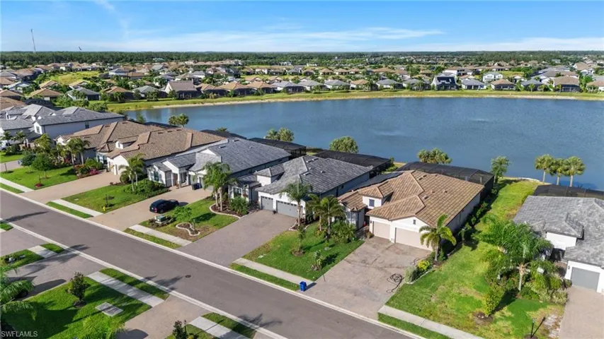 Aerial view with a residential view and a water view