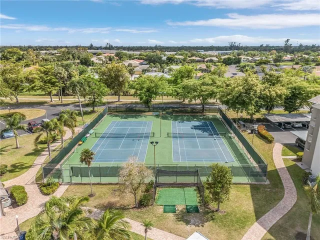 Driving Cage is in the foreground and is adjacent to the lighted tennis & pickleball courts.