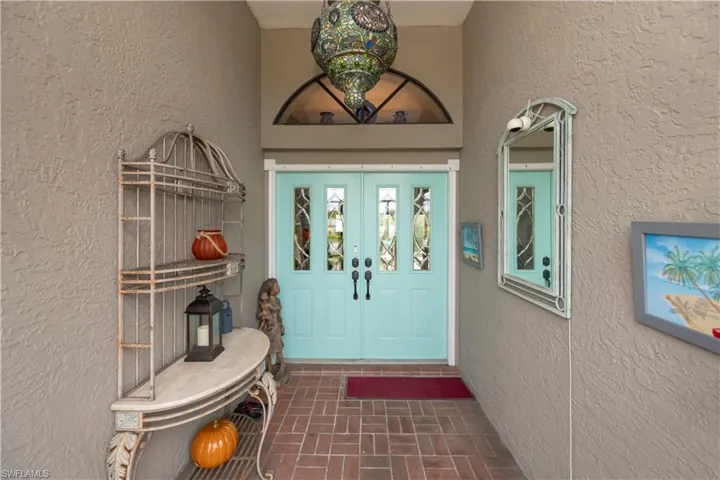 Entrance to property featuring french doors