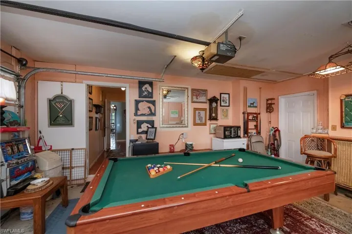 Rec room featuring pool table and ceiling fan