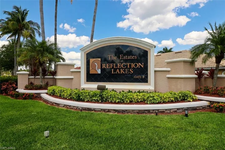 Community sign featuring a lawn