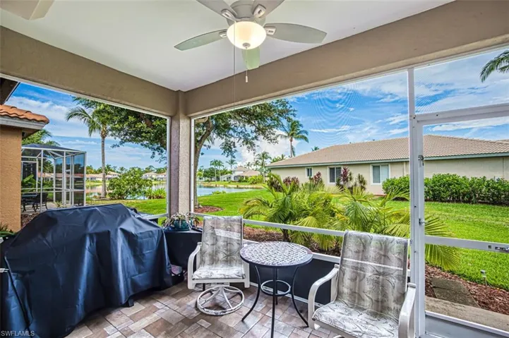 Sunroom featuring plenty of natural light and ceiling fan