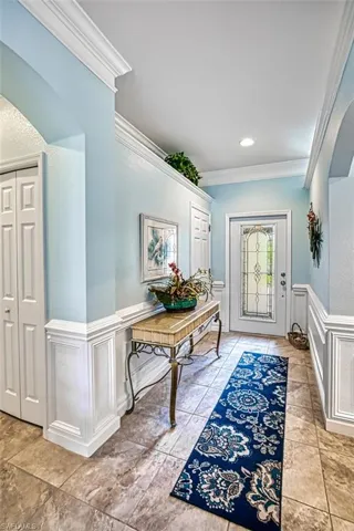 Tiled entryway with ornamental molding
