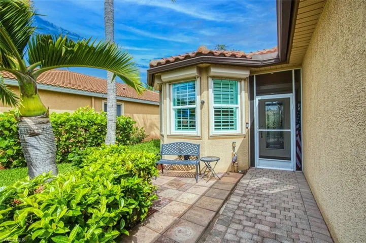 Entrance to property featuring a patio