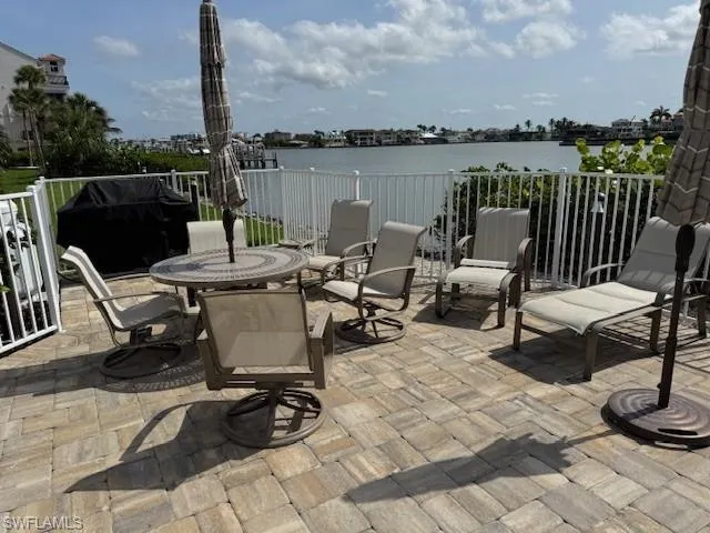 View of patio featuring a water view