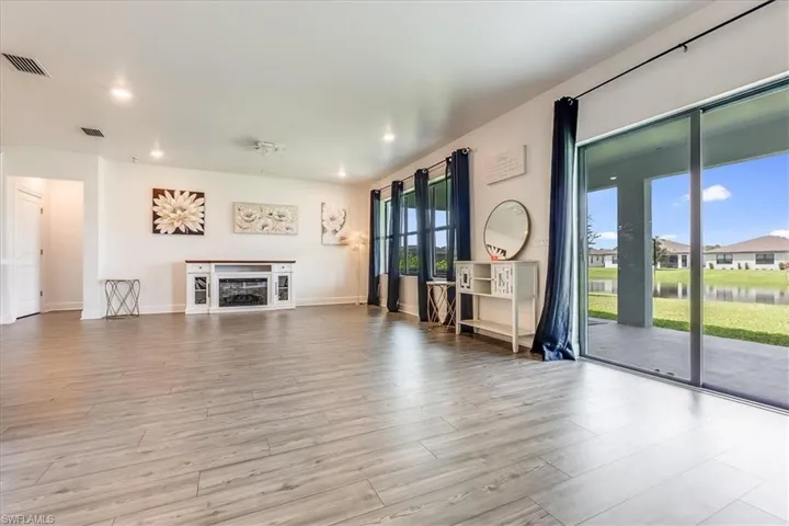 Sliding door off the dining area to the extended covered lanai